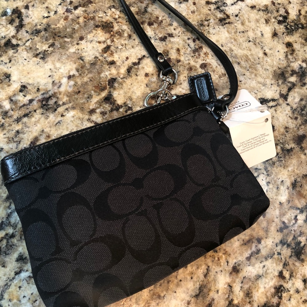 NWT COACH signature print black wristlet